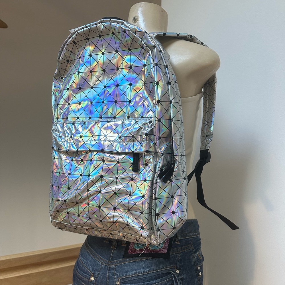 Holographic Geometric Backpack